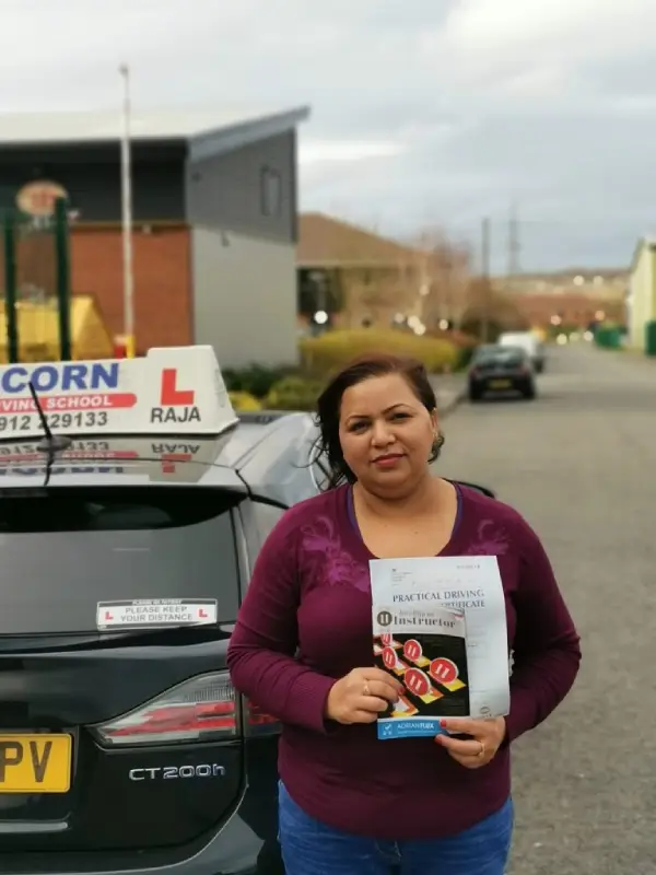 Happy learner after completing automatic driving training in Blackburn