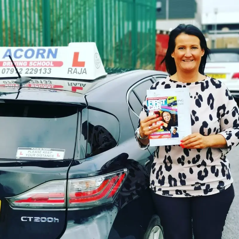 Professional automatic driving instructor with a successful student in Blackburn