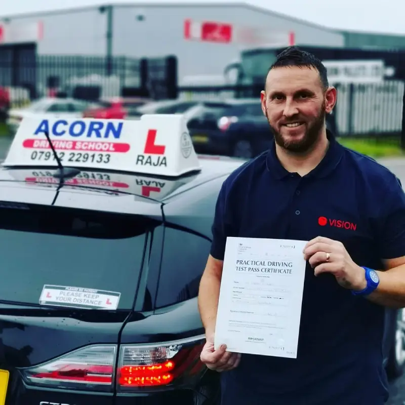 Happy student after passing the automatic driving test in Blackburn